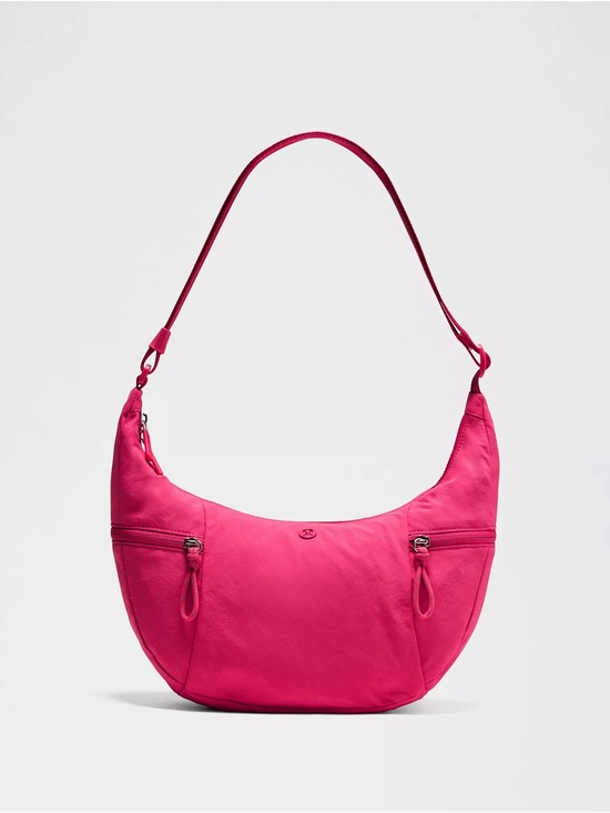 lululemon athletica Handbags - lululemon athletica slouchy sling bag 6L berry rumble NWT